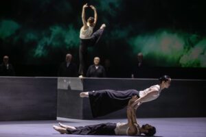Dancer performing on stage in Castor et Pollux with strong directional lighting