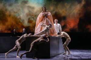 Opera scene from Castor et Pollux at the Grand Théâtre de Genève with dramatic lighting and minimal stage design
