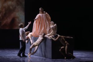 Opera scene from Castor et Pollux at the Grand Théâtre de Genève with dramatic lighting and minimal stage design