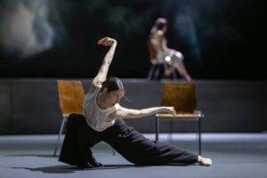 Dancer performing on stage in Castor et Pollux with strong directional lighting