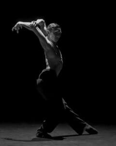 Dancer performing Marco Goecke’s Dark Matter on stage at Theater Basel