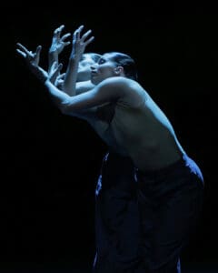 Dancers performing Marco Goecke’s Dark Matter on stage at Theater Basel