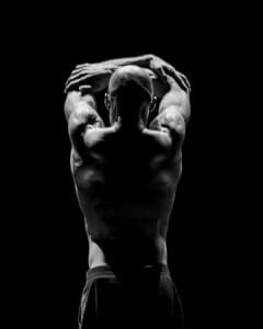 Dancer performing Marco Goecke’s Dark Matter on stage at Theater Basel