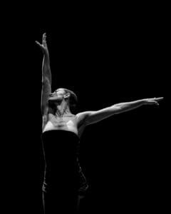 Dancer performing Marco Goecke’s Dark Matter on stage at Theater Basel