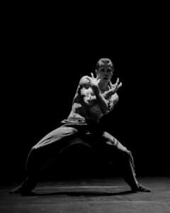 Dancer performing Marco Goecke’s Dark Matter on stage at Theater Basel