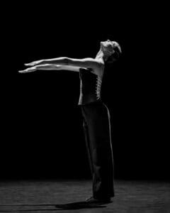 Dancer performing Marco Goecke’s Dark Matter on stage at Theater Basel