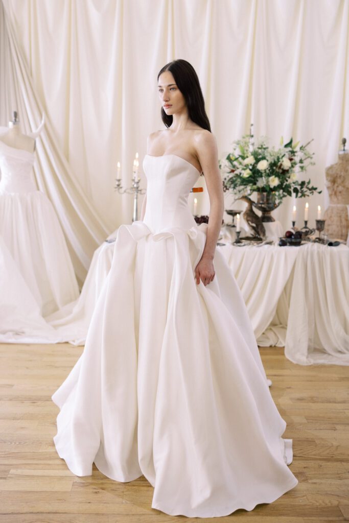 Alon Livné Bridal showcase at New York Bridal Fashion Week featuring couture wedding dresses, veils and modern bridal silhouettes.