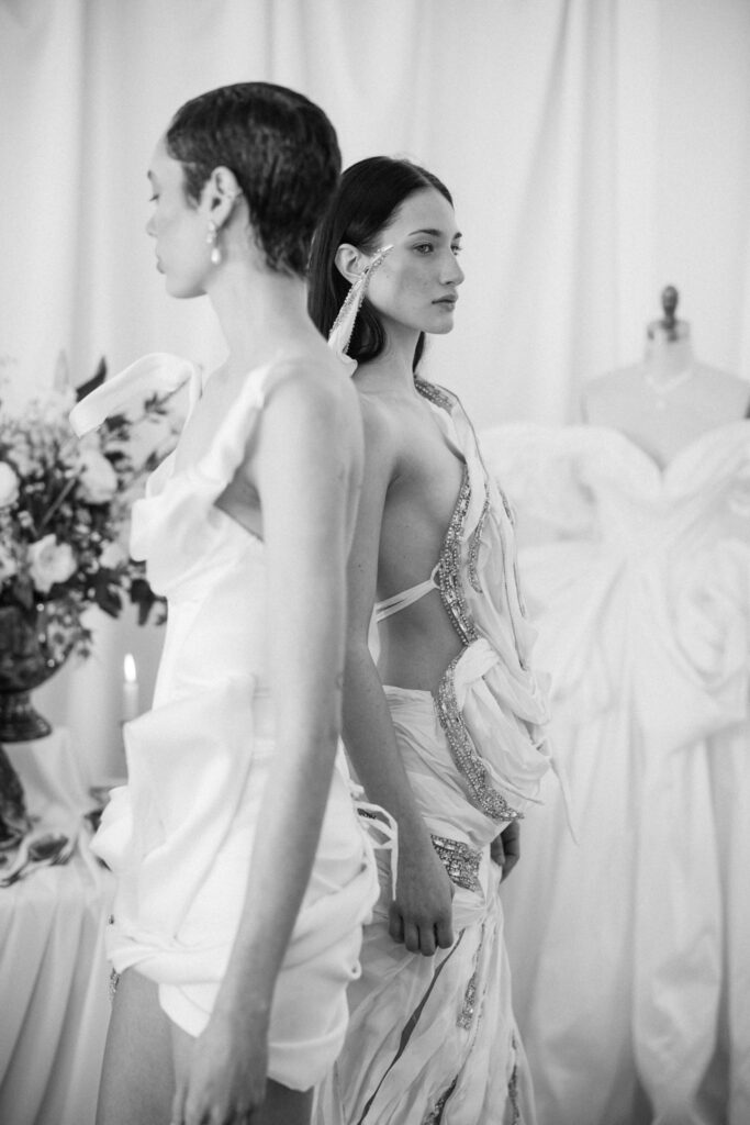 Alon Livné Bridal showcase at New York Bridal Fashion Week featuring couture wedding dresses, veils and modern bridal silhouettes.