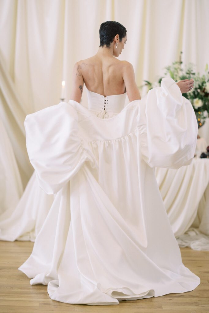 Alon Livné Bridal showcase at New York Bridal Fashion Week featuring couture wedding dresses, veils and modern bridal silhouettes.