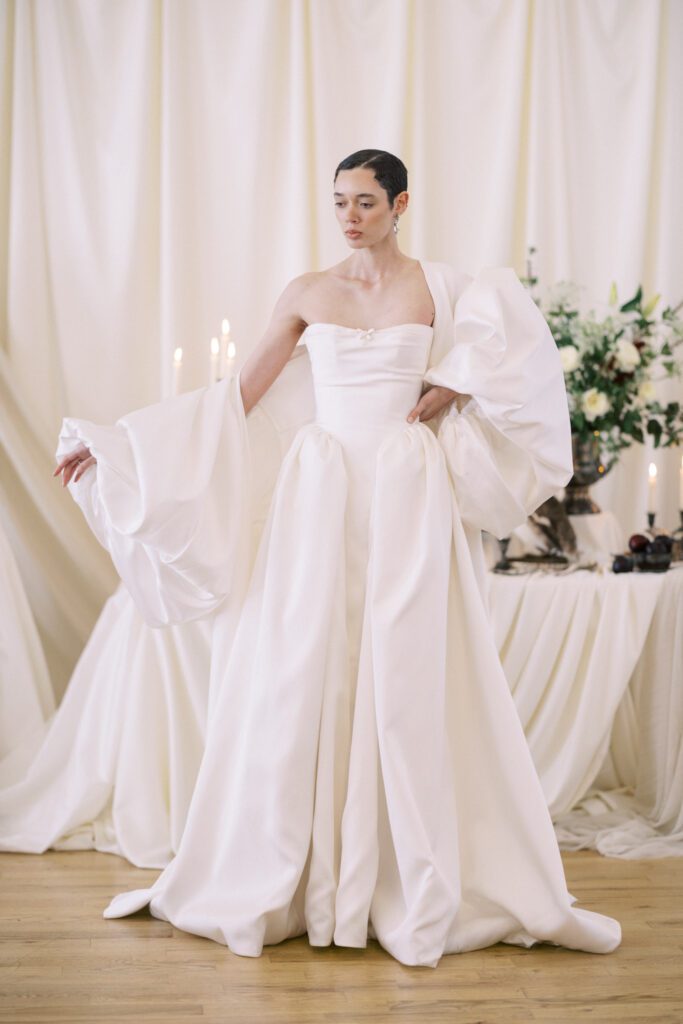 Alon Livné Bridal showcase at New York Bridal Fashion Week featuring couture wedding dresses, veils and modern bridal silhouettes.