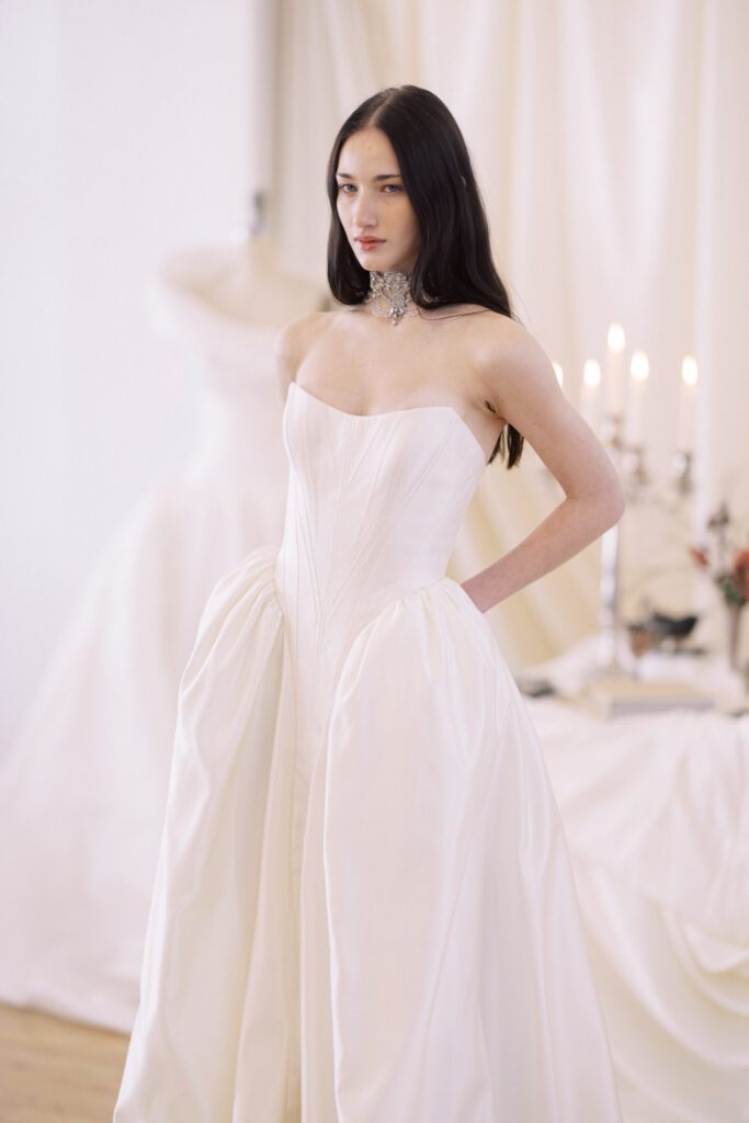 Alon Livné Bridal showcase at New York Bridal Fashion Week featuring couture wedding dresses, veils and modern bridal silhouettes.