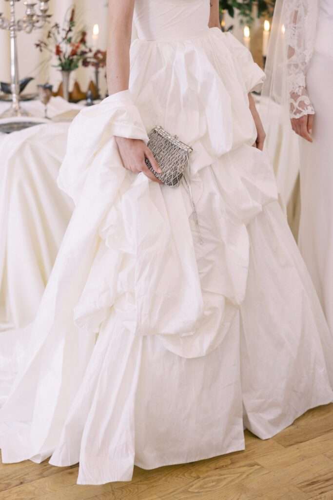 Alon Livné Bridal showcase at New York Bridal Fashion Week featuring couture wedding dresses, veils and modern bridal silhouettes.