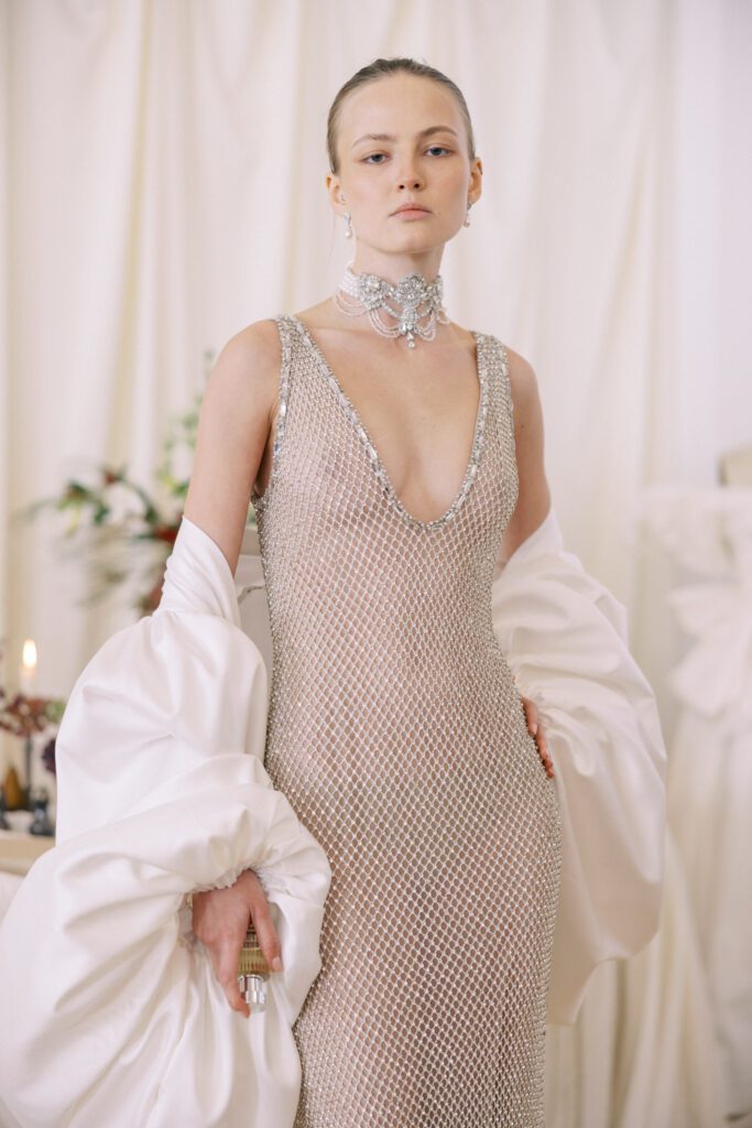 Alon Livné Bridal showcase at New York Bridal Fashion Week featuring couture wedding dresses, veils and modern bridal silhouettes.