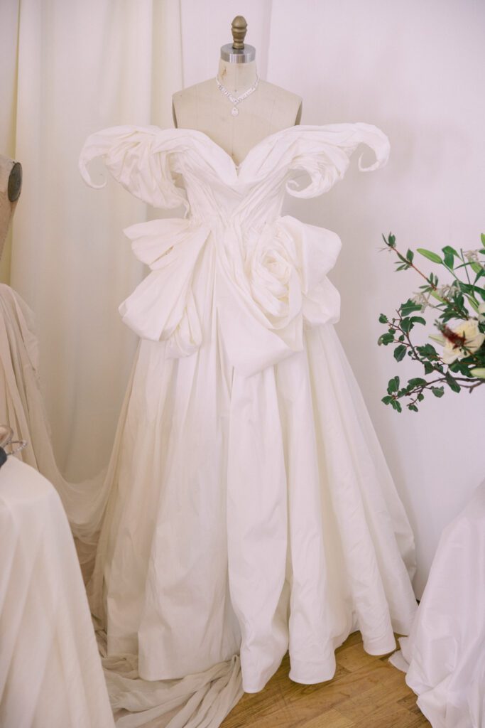 Alon Livné Bridal showcase at New York Bridal Fashion Week featuring couture wedding dresses, veils and modern bridal silhouettes.