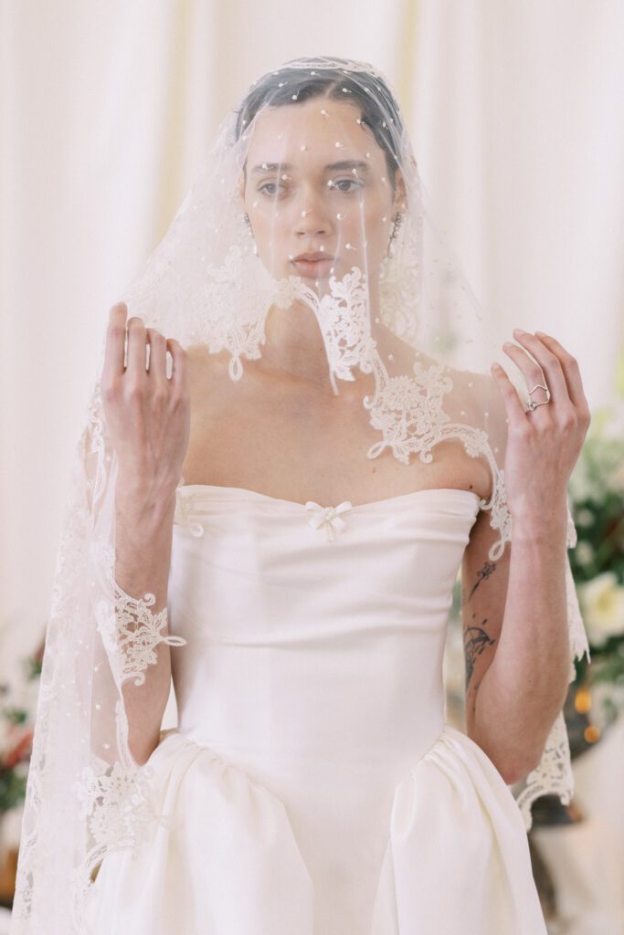 Alon Livné Bridal showcase at New York Bridal Fashion Week featuring couture wedding dresses, veils and modern bridal silhouettes.