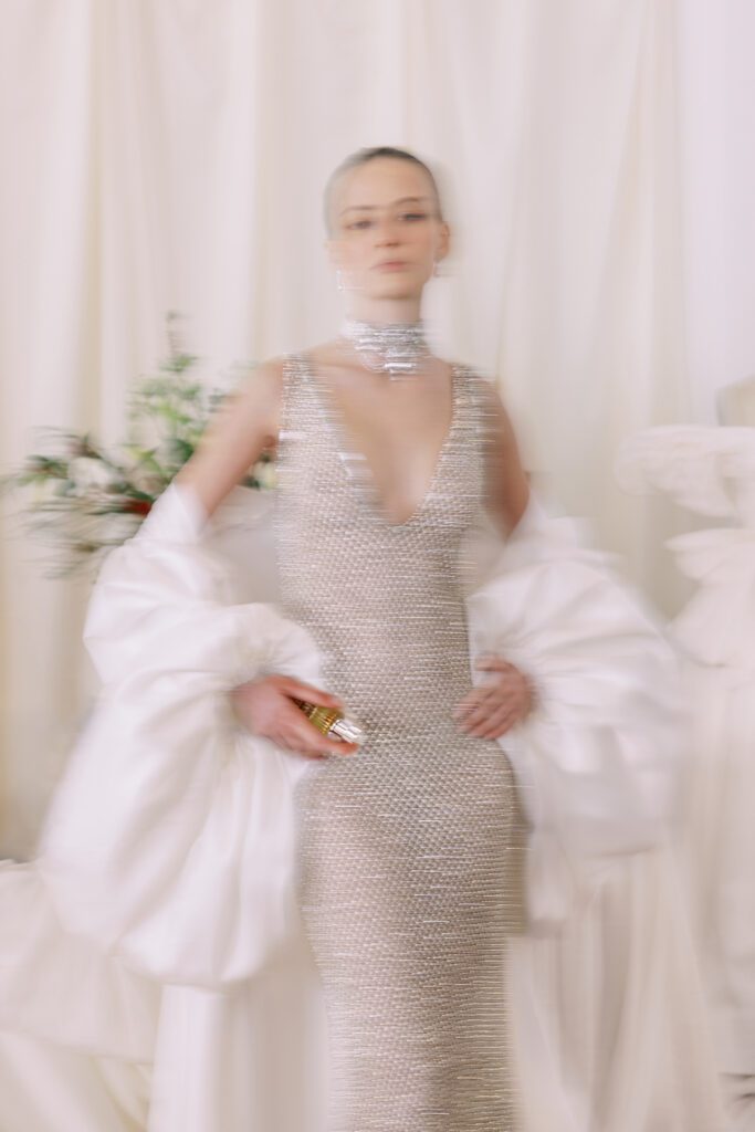 Alon Livné Bridal showcase at New York Bridal Fashion Week featuring couture wedding dresses, veils and modern bridal silhouettes.